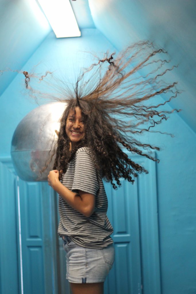 Jumping shadows with crazy hair at the Magic House