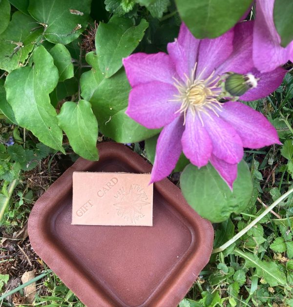 Leather Gift Card in leather tray with flower